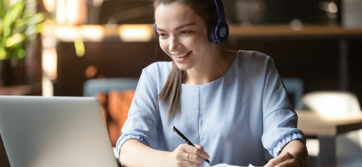Smiling,Girl,Student,Wear,Wireless,Headphone,Study,Online,With,Skype